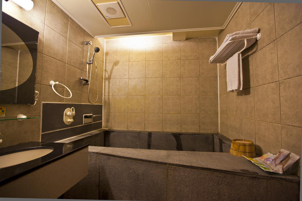 Tian Long Hotel Цзяоси Экстерьер фото
