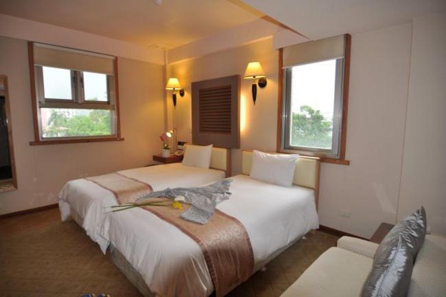 Tian Long Hotel Цзяоси Экстерьер фото