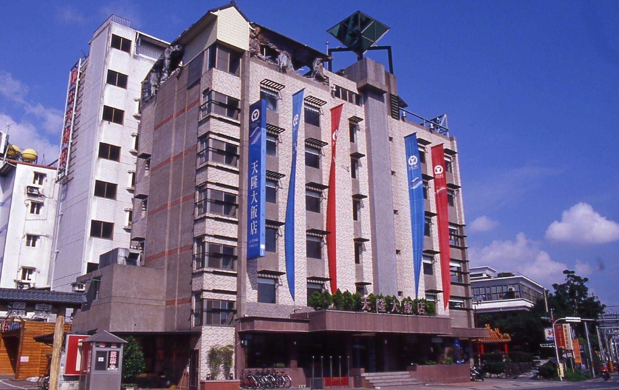 Tian Long Hotel Цзяоси Экстерьер фото